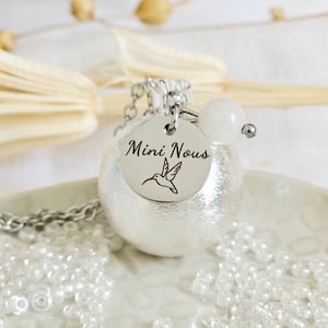 Mini brushed silver pregnancy bola with hummingbird and moonstone on stainless steel chain
