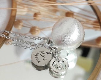 Pregnancy bola Mini We little feet and Jade stone on brushed silver plated ball and hypoallergenic stainless steel chain.