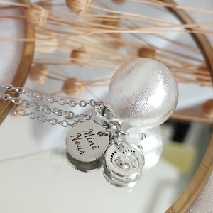 Pregnancy bola Mini We little feet and Jade stone on brushed silver plated ball and hypoallergenic stainless steel chain.