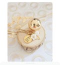 Gold pregnancy bola Mini Nous 2026 mother-of-pearl flower, leaf and moonstone on a gold chain product logo