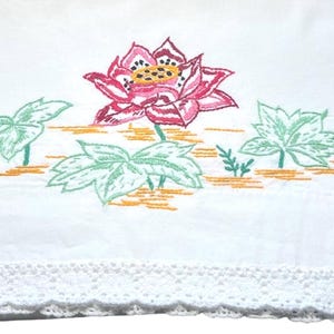 Vintage embroidered pillowcase with embroidery red flowers and white trim