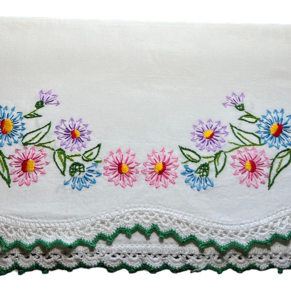 Vintage embroidered pillowcase with pink blue and purple flowers  super soft and beautiful with green trim