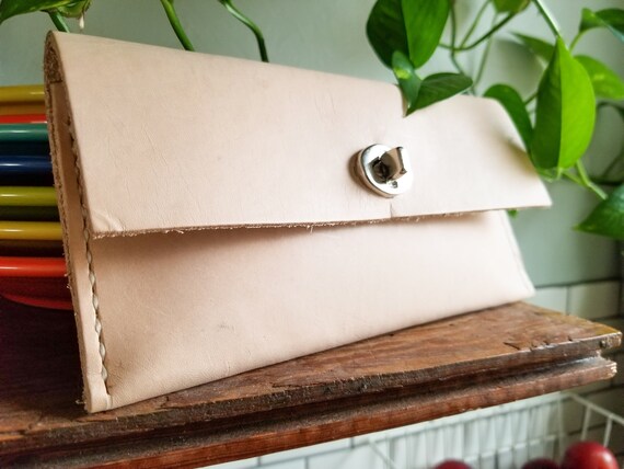 handmade leather clutch