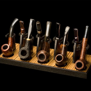 PIPE STAND Zebrano Solid ebony and zebrawood Space for 9 pipes.