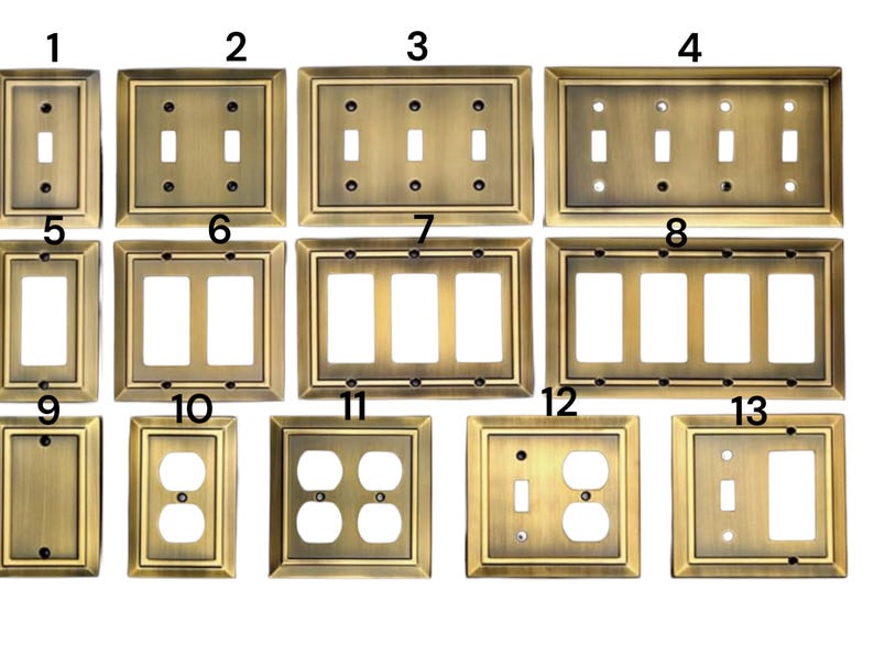 May include: A set of 13 antique brass wall plates for light switches and electrical outlets. The plates are numbered 1 through 13 and feature different configurations of switches and outlets.