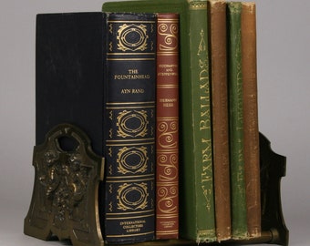 Cherub Cast Iron Sliding Book Rack: Vintage Judd Manufacturing