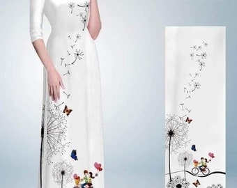 May include: White dress with a black and white dandelion print. The dress features a couple riding a bicycle with hearts and butterflies. The dress is long and has a round neckline. The dress is made of a soft, comfortable fabric. AD B3495 W