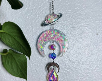 Iridescent rainbow making suncatcher with resin moon and planet charm