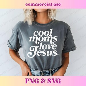 May include: A gray t-shirt with the text "cool moms love Jesus" in white lettering.