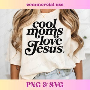 May include: A white t-shirt with black text that reads "Cool Moms Love Jesus" in a retro font.