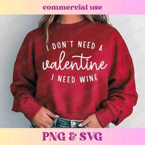 May include: Red sweatshirt with the text "I don't need a valentine I need wine" in white lettering.