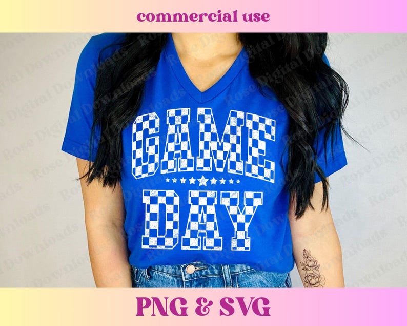 May include: A royal blue t-shirt with a white checkered design that says "GAME DAY" in a vintage style font.