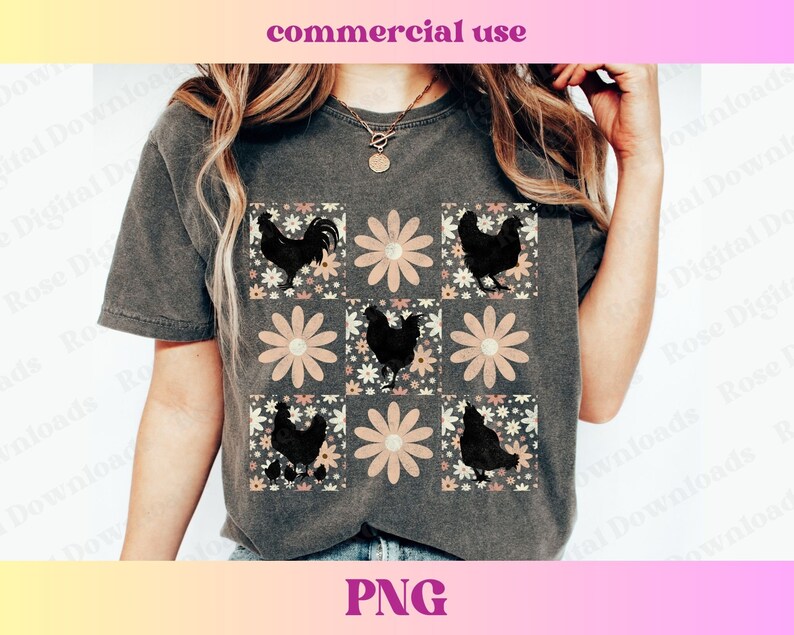 May include: A gray t-shirt with a design of black silhouettes of chickens and flowers in a patchwork pattern.