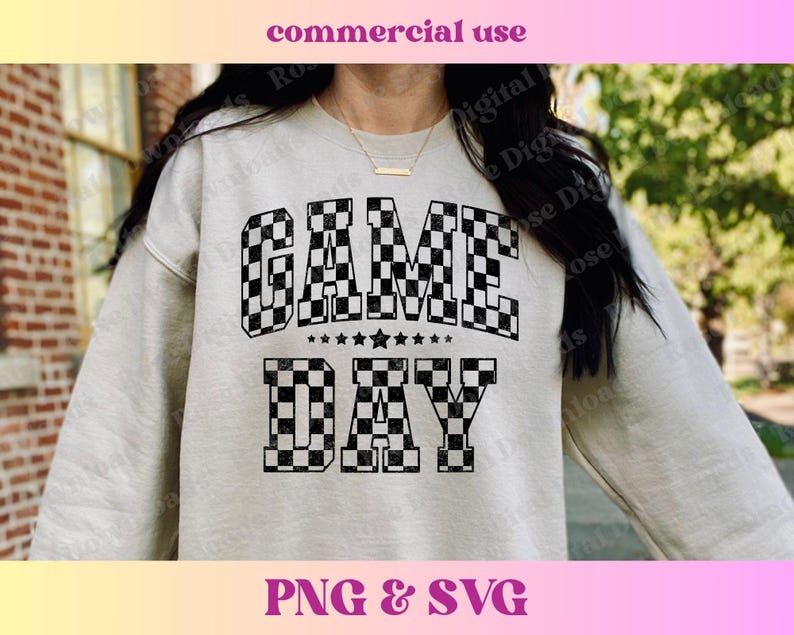 May include: A white sweatshirt with a black and white chequered design that says "GAME DAY".
