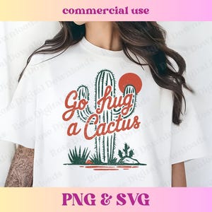 May include: White t-shirt with a green cactus graphic and the text "Go hug a cactus".