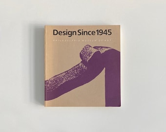 May include: A tan book with the title "Design Since 1945" and the text "Philadelphia Museum of Art" printed on the cover. The cover features a purple abstract design.