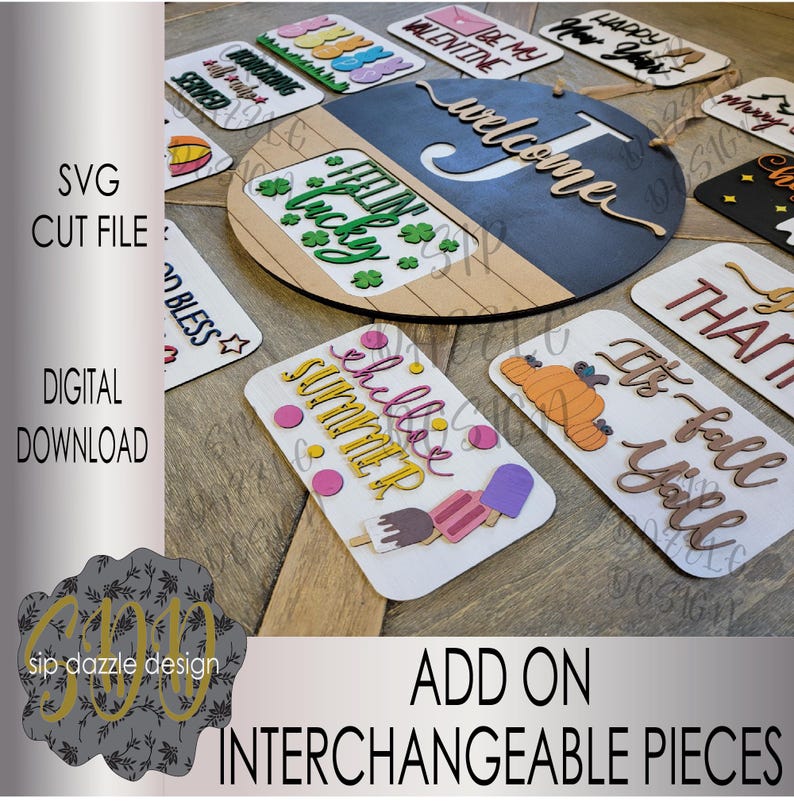 May include: A set of interchangeable wooden signs with various designs and phrases, including "Welcome", "It's Fall Y'all", "Hello Summer", "Feeling Lucky", "Happy New Year", "Be My Valentine", "Merry Christmas", and "Thank You". The signs are designed for a round wooden door hanger.