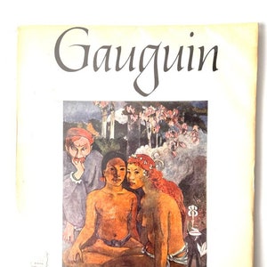 May include: A book cover featuring a painting by Paul Gauguin. The cover shows three figures in a jungle setting. The figures are a man with a red hat, a woman with red hair, and a young man. The book title "Gauguin" is printed in black cursive lettering at the top of the cover. The text "16 beautiful full color prints" is printed at the bottom of the cover.