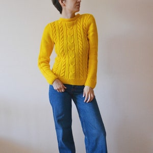 Bright yellow sweaters top