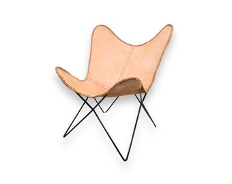 Lounge Bat chair with Black frame and light leather