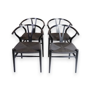 Set Of Four Model CH24 Wishbone Chairs In All Black By Hans J. Wegner For Carl Hansen & Son