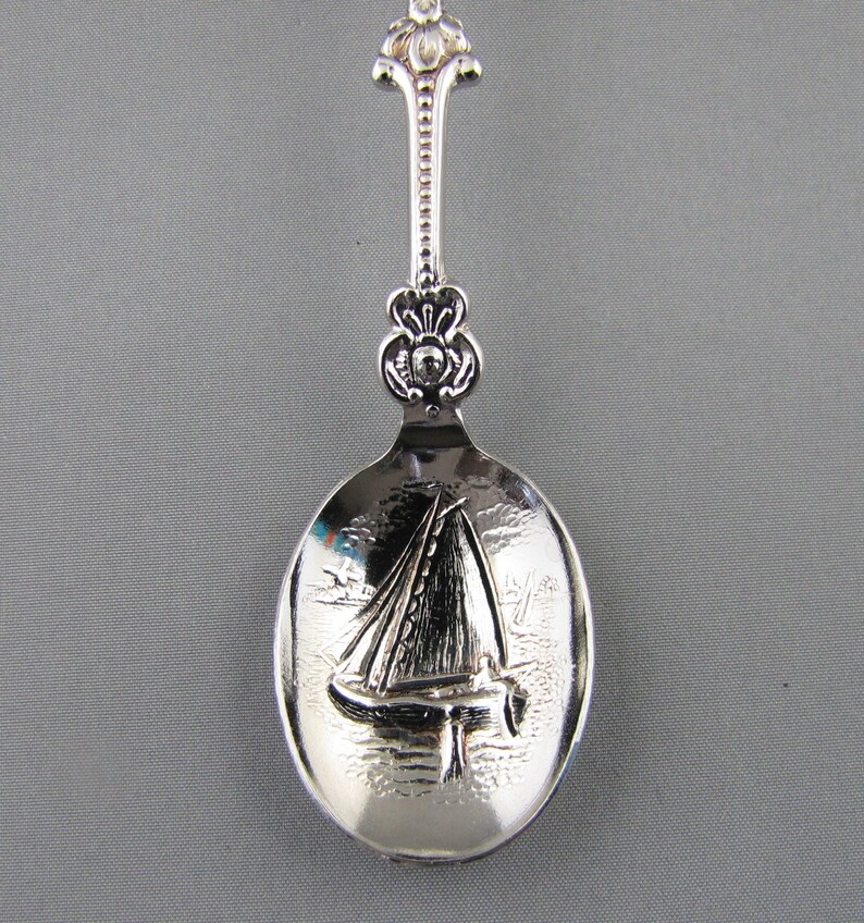 Dutch Lady Carrying Milk Buckets on Yoke Sailing Boat in Embossed Bowl Holland NETHERLANDS Dutch Collectible Souvenir Spoon