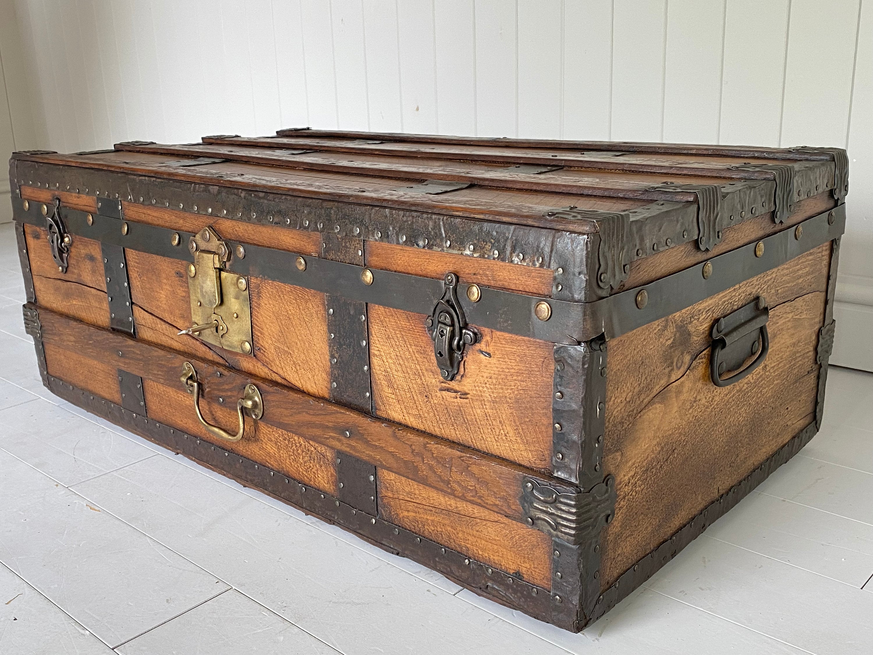 yellow antique travel trunk