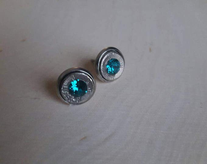 Teal 9mm bullet earrings, backings are stainless steel. Swarovski crystals