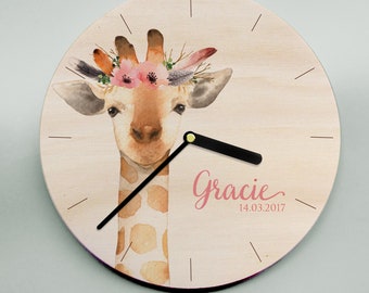 Large wall clock - gorgeous giraffe wearing a floral crown! Available in two sizes and with names, dates, dashes, numbers or neither!