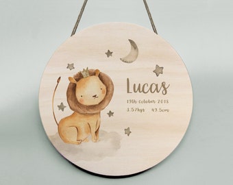 A handmade wooden wall hanging for a nursery or childs room - featuring a lion and customised birth details!