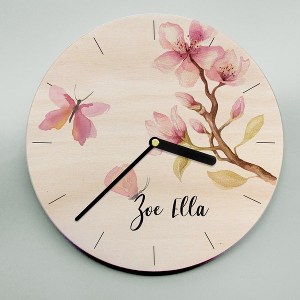 Trending now - wooden clock featuring customised name amongst delicate pink cherry blossom branches & butterflies. Stylish and practical!