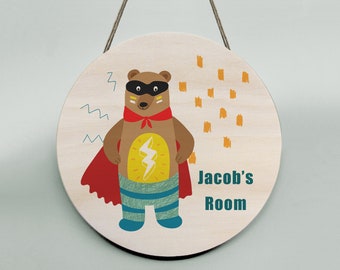 Handmade 20cm wooden wall hanging - this superhero bear will bring joy to any kids room! Personalise (personalize) with your own details.