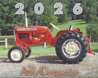 May include: A red Allis-Chalmers D12 tractor with white wheels and black tires, set against a backdrop of green trees and a pond. The image includes the text "2026" and "The Allis Connection".