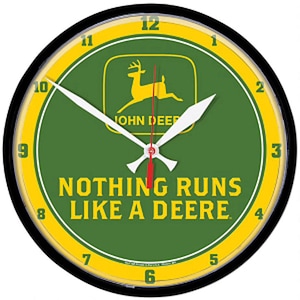 May include: A black and yellow round wall clock with a green face. The clock features the John Deere logo with a deer and the text "NOTHING RUNS LIKE A DEERE".