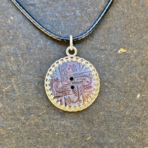 Antique Carved Mother of Pearl Button Pendant Necklace on Woven Cord MPN851
