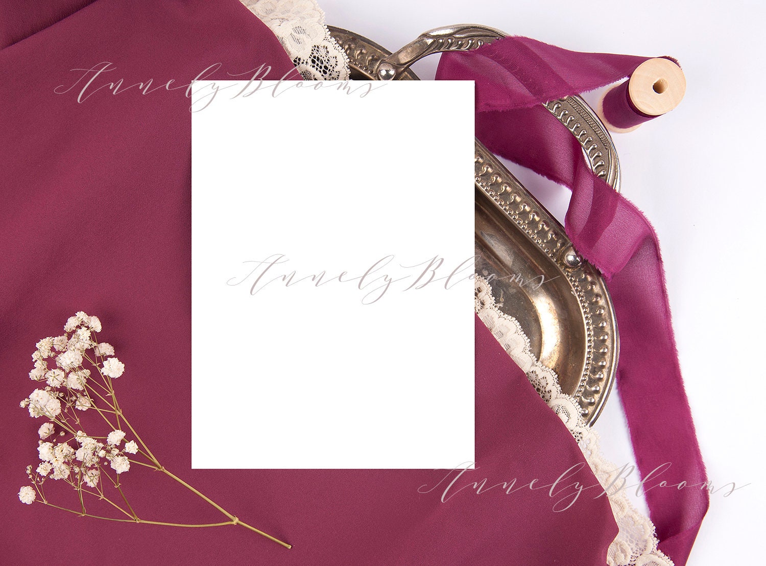 Wedding mockup with ribbon silver tray on a burgundy silk