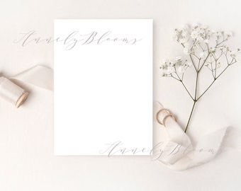 Wedding styled mockup with silk ribbon, white flower and gold rings. Elegant mockup for your wedding designs, PSD, JPG, WS