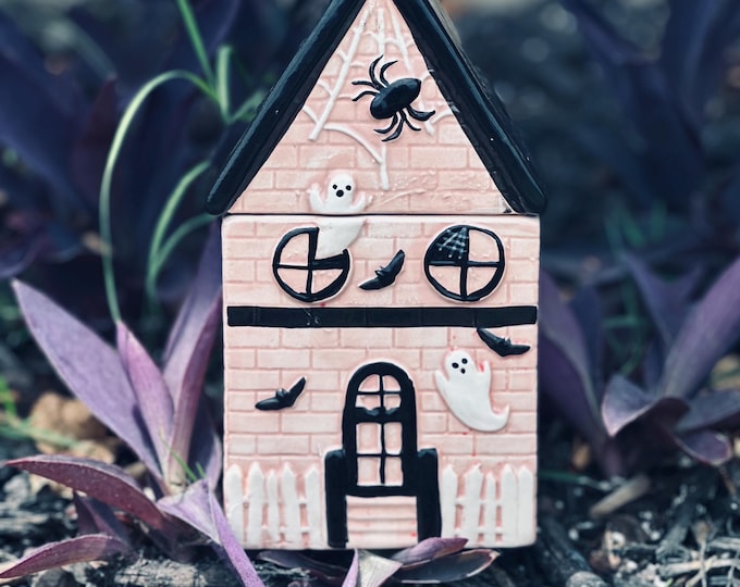 Spooky house candle