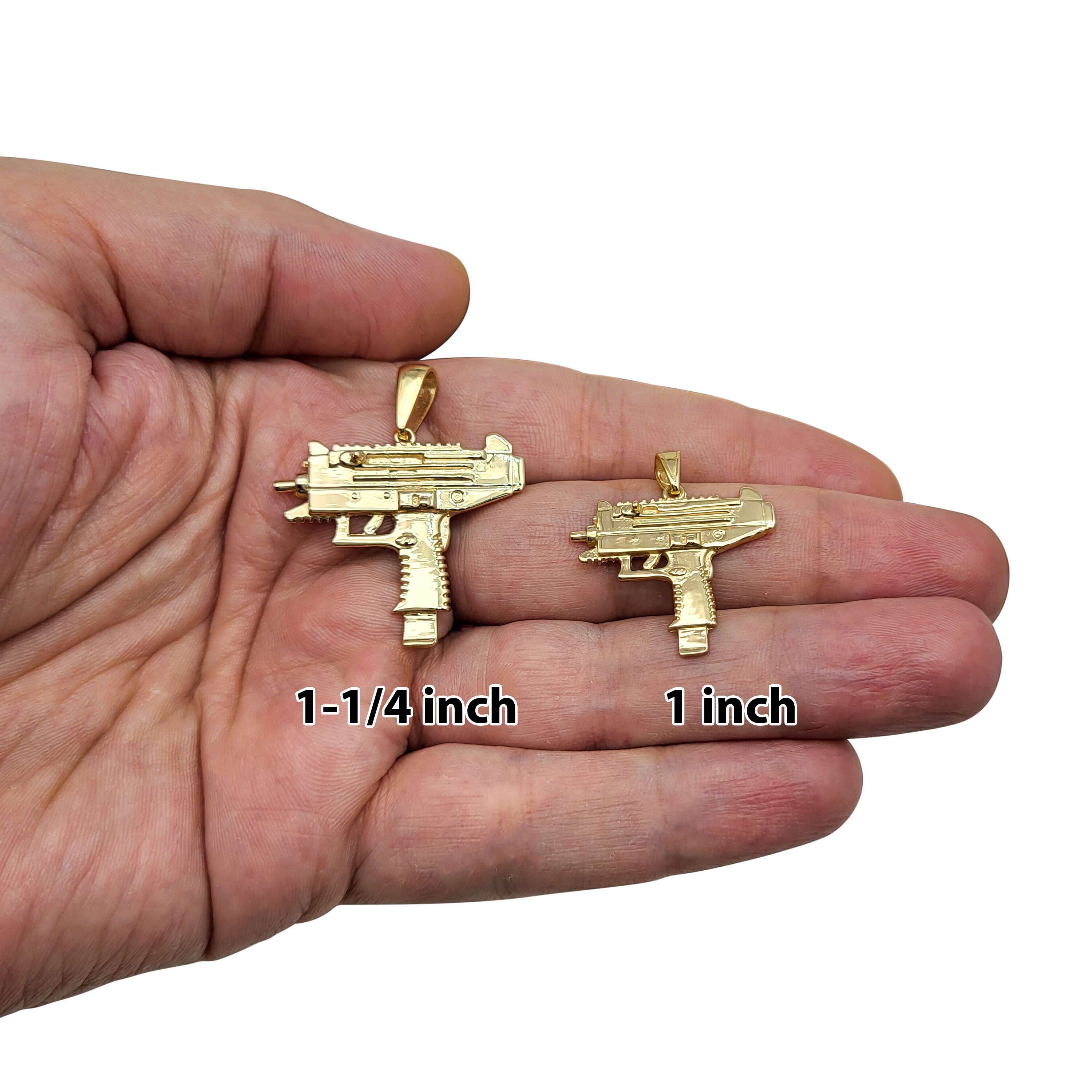 Gold uzi pendant outlet