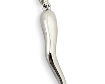 May include: A polished silver pendant in the shape of a curved horn. The pendant has a smooth, reflective surface and a small loop at the top for a chain. The horn shape is a common Italian good luck charm.
