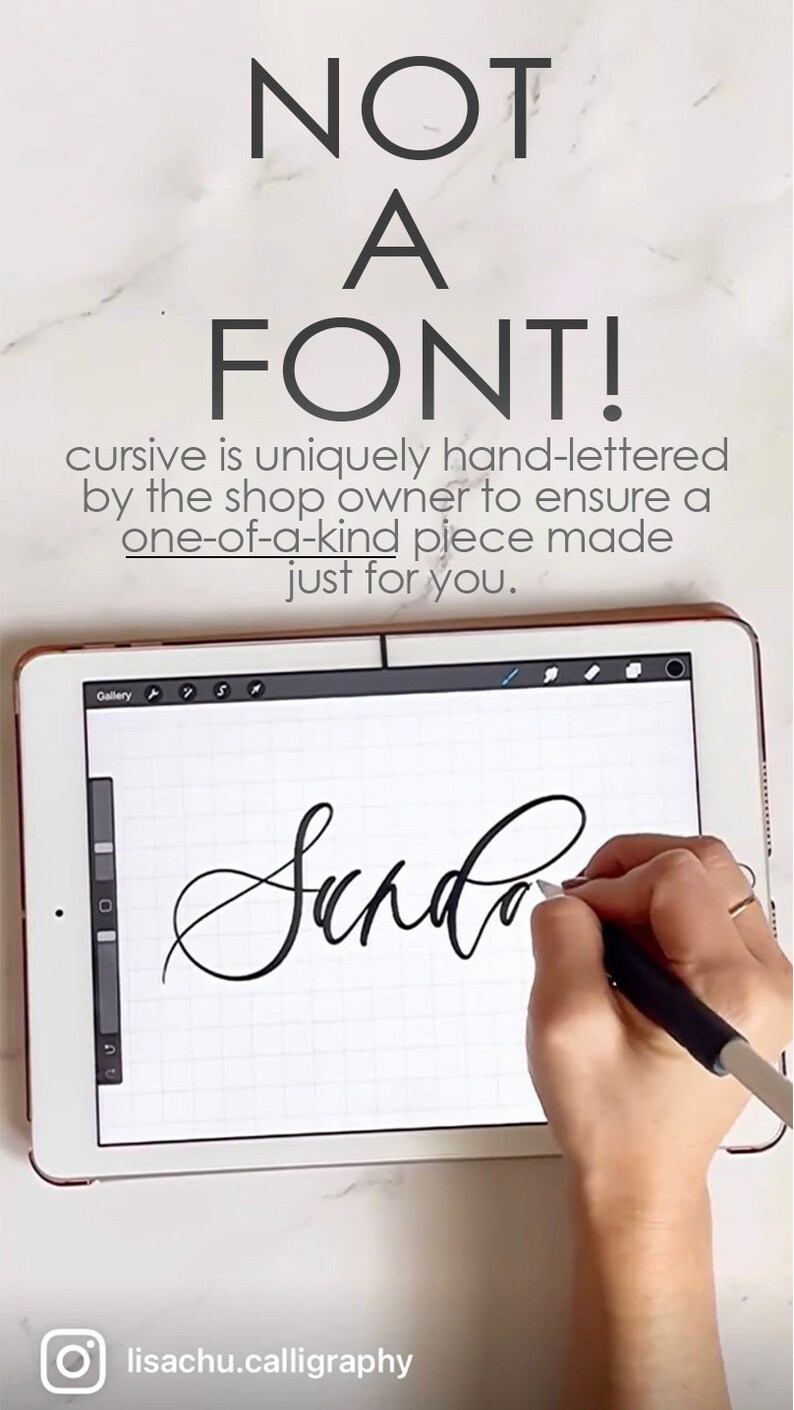 May include: A hand uses a stylus to write the word "Sunday" in cursive on a digital tablet. The text "NOT A FONT! cursive is uniquely hand-lettered by the shop owner to ensure a one-of-a-kind piece made just for you." is displayed above the tablet.
