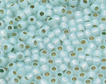 6/0 Silver Lined Milky Light Peridot Toho #2118 - 6/0 Toho Seed Beads - 10 Grams, 25 Grams, 50 Grams
