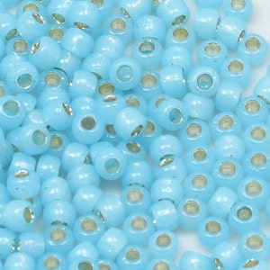 6/0 - Miyuki #573 Dyed Aqua Silver Lined Alabaster - 10 grams, 25 grams, 50 grams, 6&quot; Tube (28 grams)