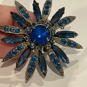 Vintage blue costume starburst pin