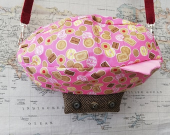 Sac rose de bateau d’air de biscuit