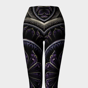 May include: Black leggings with a purple and gold mandala pattern.