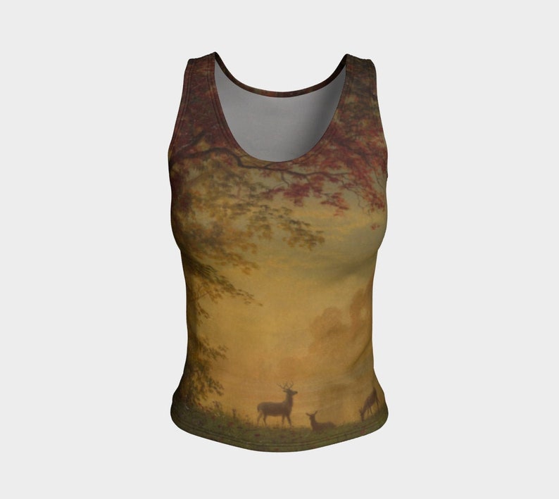 May include: A sleeveless tank top featuring a vintage-inspired print of a forest scene with deer. The print uses a muted colour palette of browns, yellows, and greens.