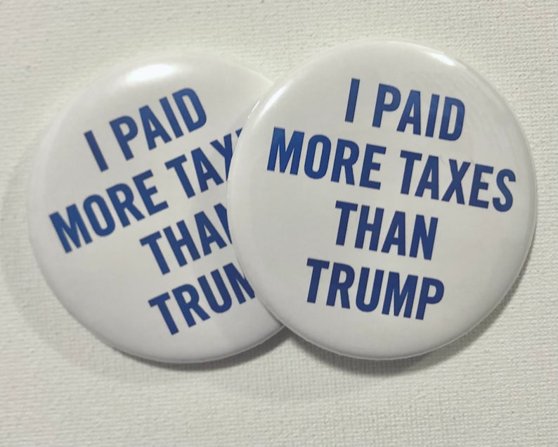 I paid more taxes than Trump buttons
