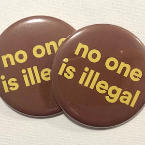 No One Is Illegal Buttons