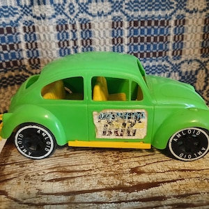 Vintage Plastic Volkswagen Beetle toy car by Amloif Toys, made in USA